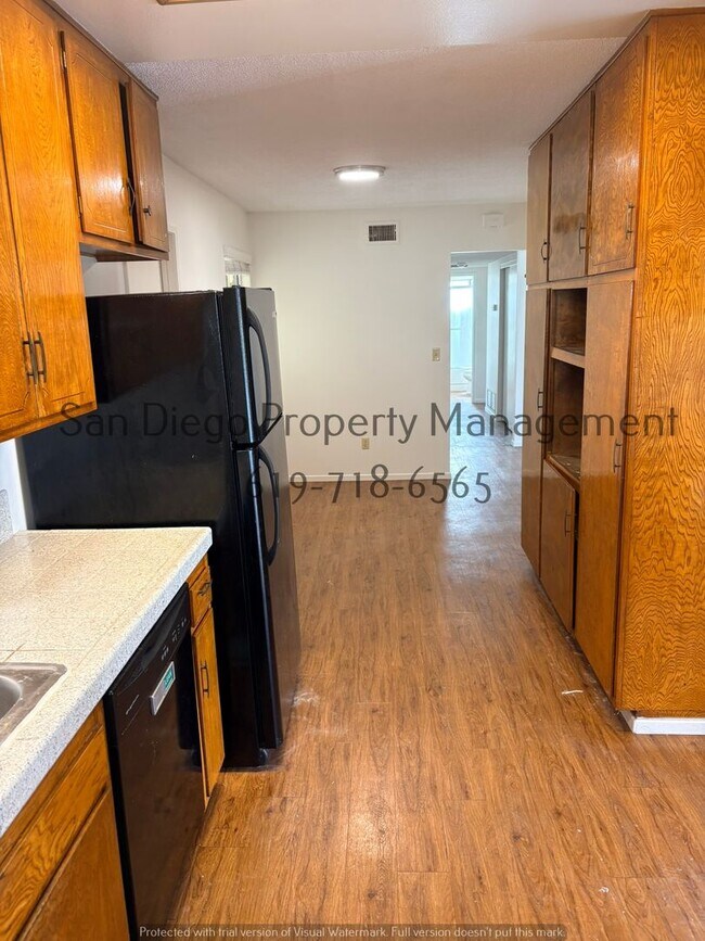 Building Photo - Charming 3-Bed with New LVP Flooring & Scenic Backyard Views