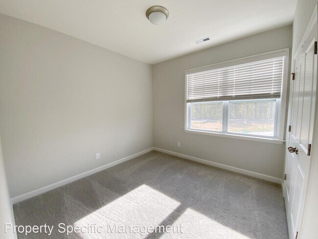 Building Photo - 3 br, 2.5 bath House - 702 Carraway Street