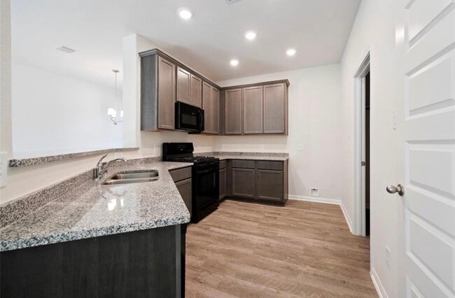 Building Photo - 25290 Pomegranate Pl