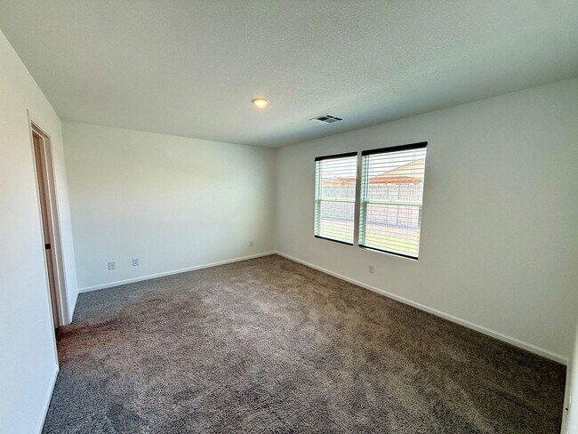 Building Photo - Spacious 4 Bedroom Home with Solar & Moder...