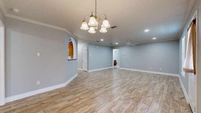 Building Photo - Completely repainted 4 bedroom ALL TILE ho...