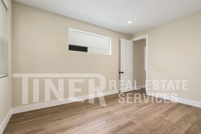Building Photo - Elegant Modern Living