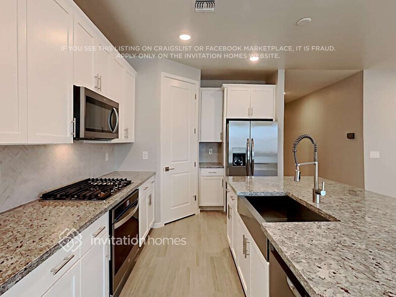 Building Photo - 40449 W Crane Dr