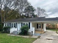 Building Photo - Charming 2 Bed, 1 Bath, Attached Carport and Spacious Yard!