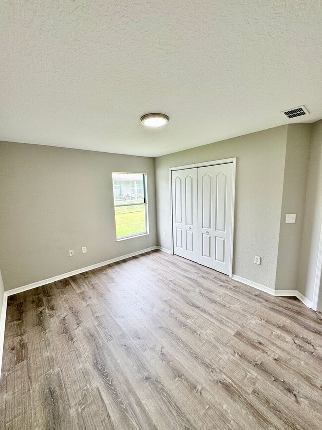 Building Photo - 4 Bedroom 2 Bath Home in Poinciana Village 3