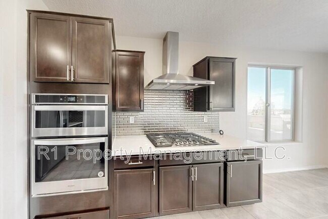 Building Photo - 6405 Kings Cyn Cv NE