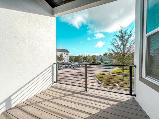 Building Photo - Luxury 4-Bedroom Townhome in Laureate Park – Now Available!