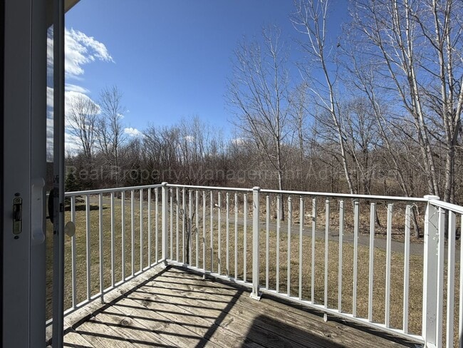 Building Photo - Rare Corner Upper Condo with Vaulted Ceilings, Private Balcony and 2 Car Garage - Right Across fr...