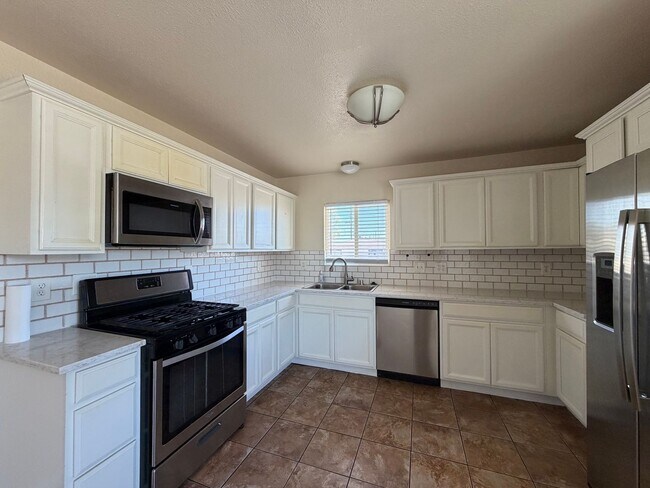 Building Photo - 3 Bedroom 2 Bathroom House with Central A/C , 2 Car Garage and Beautiful Backyard with Covered Patio