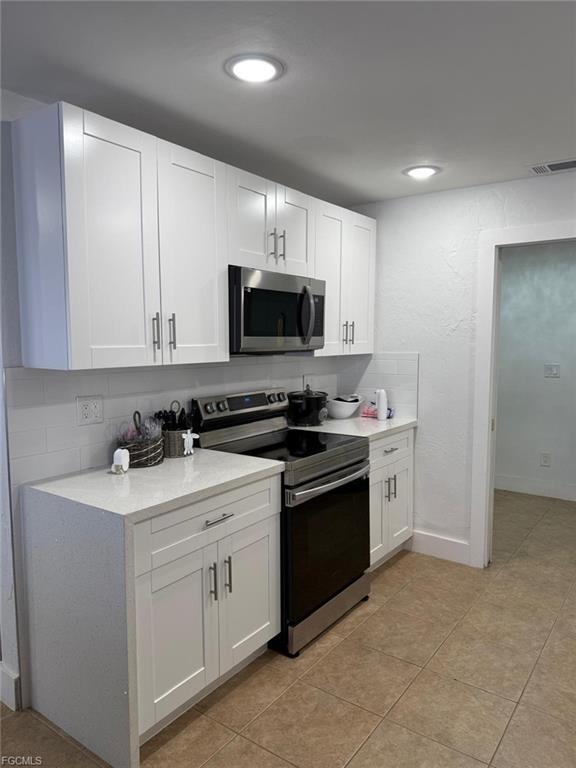 Building Photo - 1335 NE Pine Island Rd