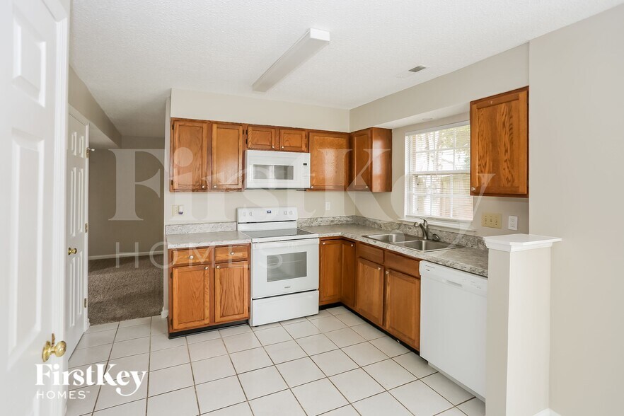 Building Photo - 9419 White Cedar Ct