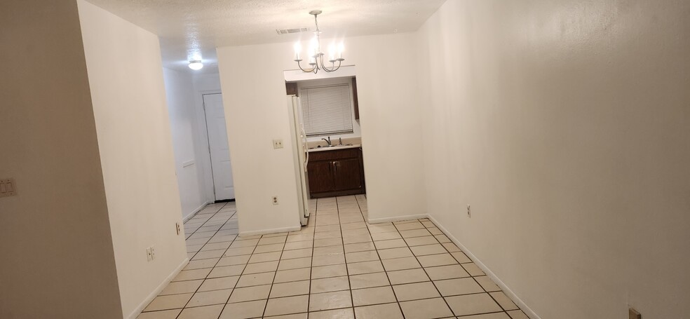 View of kitchen from living room - 1552 University Ln