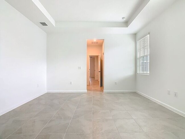 Building Photo - New Luxury Townhome in Celebration with All porcelain tiled floors. Island Village new construction