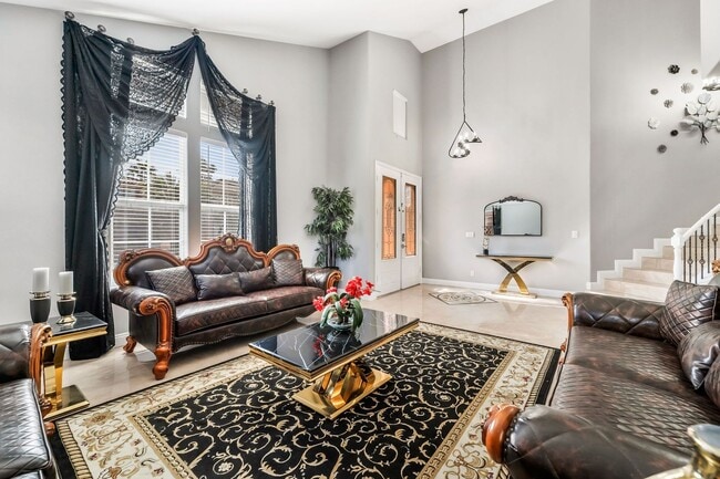 Building Photo - Fully Furnished Luxury Living with Expansive, Move-In Ready Comfort!