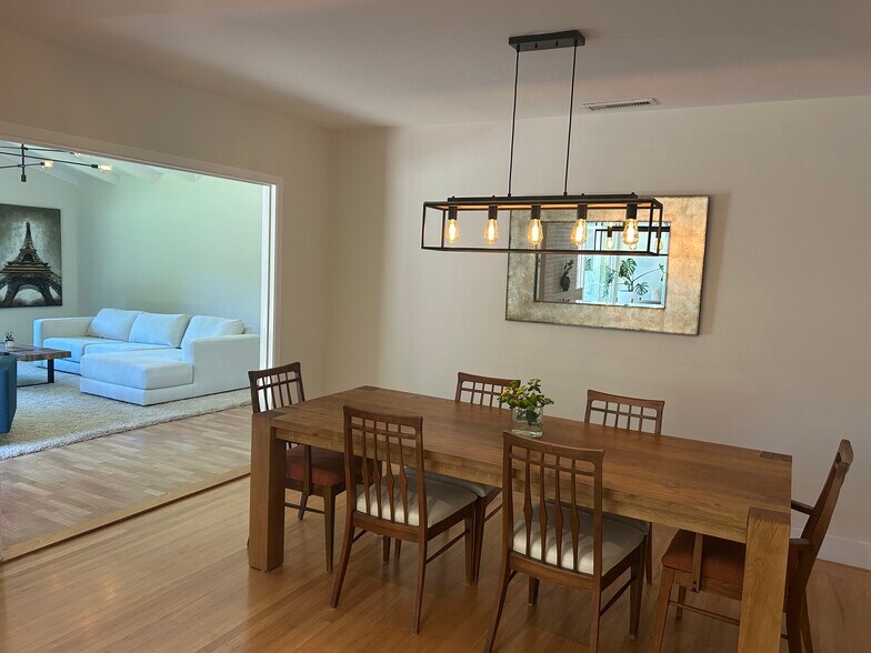 Current Dining room with farmhouse light fixture. - 1415 Butterfield Rd