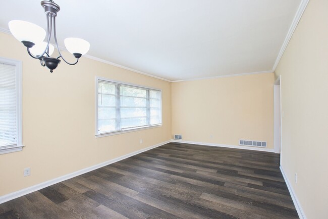 Building Photo - Vintage Charm with Modern Upgrades and Sunroom Living