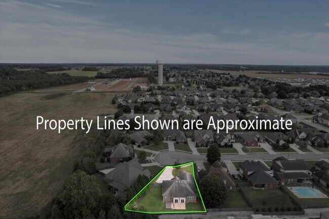 Building Photo - Fenced Yard! Storm Shelter! Conveniently l...