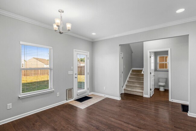 Building Photo - Newer Home, Granite Counter-Tops, Wood Laminate Flooring, SS Appliances, Garage, Fenced, Must See!