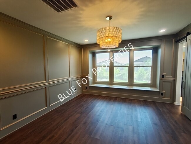 Building Photo - 8454 N Lone Ranger Rd