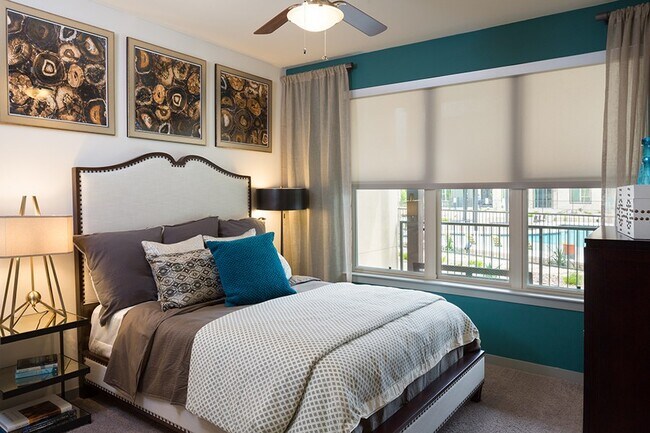Building Photo - Spacious Than You Think & Richly Featured