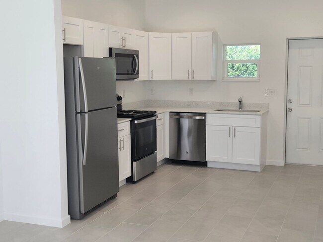 Building Photo - BRAND NEW-- TWO BEDROOM + TWO BATHROOMS- SOUTH LEHIGH ACRES