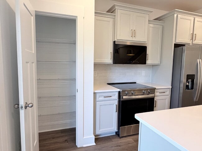 Building Photo - Brand-New 3BR Townhome with Garage in Clayton Crossing