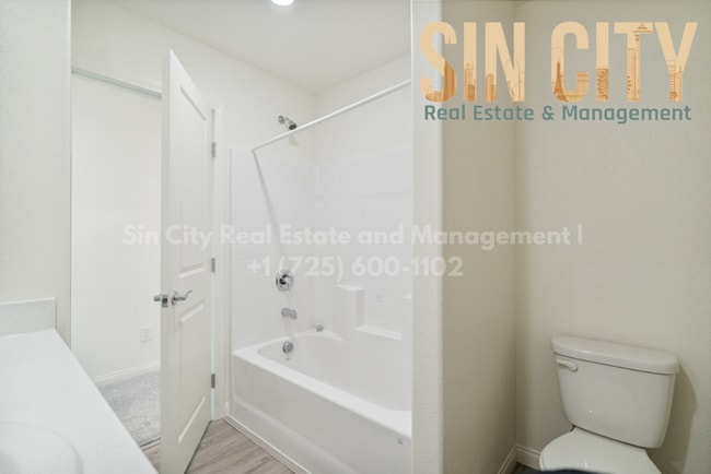Building Photo - "Charming 4-Bed Oasis on La Cura Avenue: Spacious Living with 2.5 Baths in Vibrant Las Vegas!"