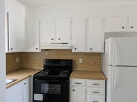 Building Photo - 211 8th Ave Dr SE