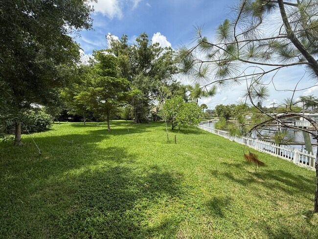 Building Photo - Waterfront Oasis Awaits!  3/2 with Attache...