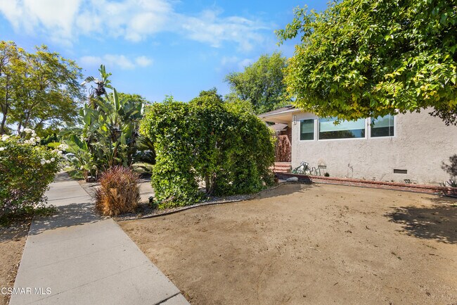 Building Photo - 7039 Sylvia Ave