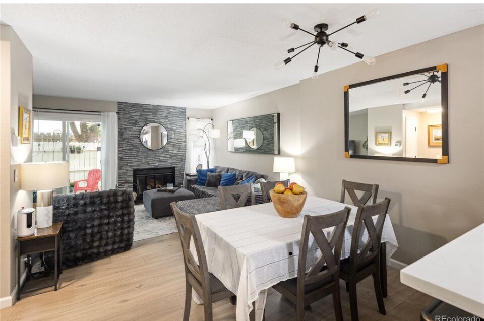 Kitchen into living room - 10587 W Maplewood Dr
