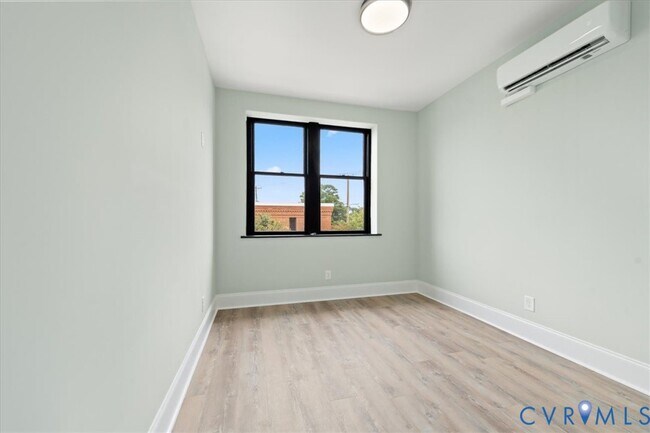 Building Photo - 207 E Broadway