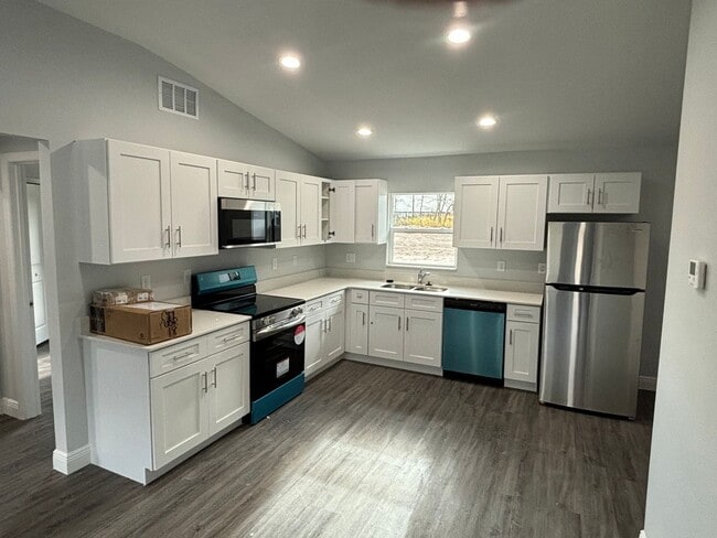 Building Photo - Brand New Designer Home Ready for Family