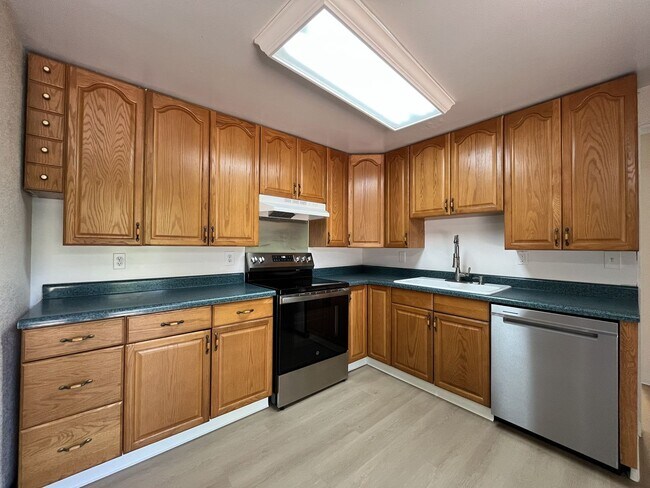 Building Photo - Charming Ranch Home with Sunroom or 4th Bedroom, Two-Car Garage and Fenced Backyard