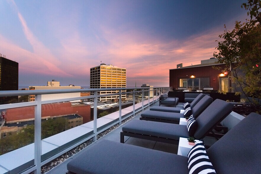 Loungers on Rooftop Deck - The Rhapsody at Davis Station
