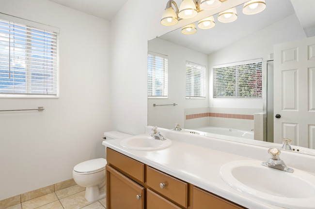 Building Photo - Modern 5 Bedroom Home with 3Car Garage in ...