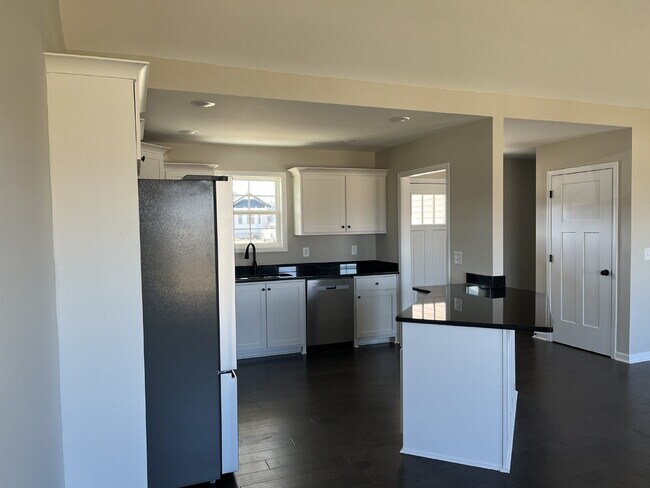 Building Photo - BRAND NEW CONSTRUCTION. NEVER LIVED IN. LAWN CARE INCLUDED.