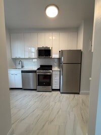 Building Photo - The Leslie — A Private Garden Enclave for the Modern New Yorker