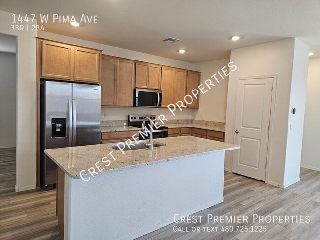 Building Photo - 1447 W Pima Ave