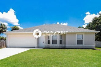 Building Photo - 3 Bedroom Pet-Friendly Home in PALM BAY, FL with Main Street Renewal