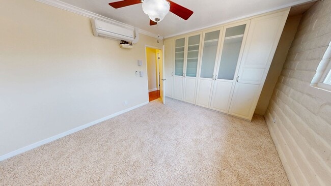 Building Photo - Freshly Painted Upstairs Condo with Community Pool