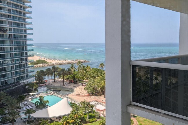Building Photo - 10275 Collins Ave