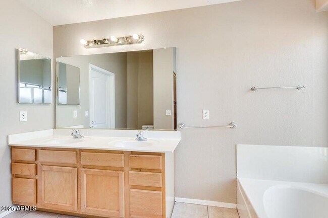 Building Photo - 9346 E Plana Ave