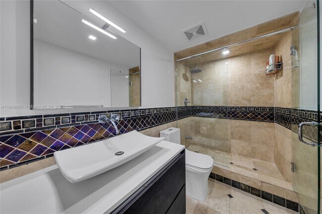 Building Photo - 5555 Collins Ave