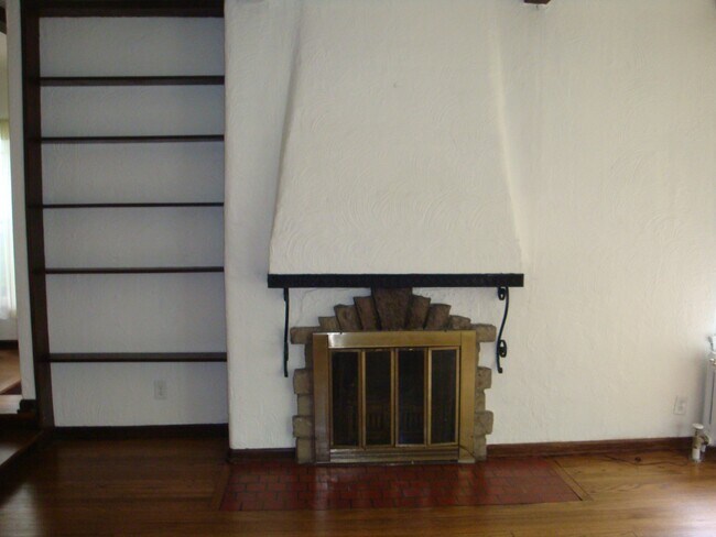 Book Shelf and Faux Fireplace - 2206 E Stratford Ct
