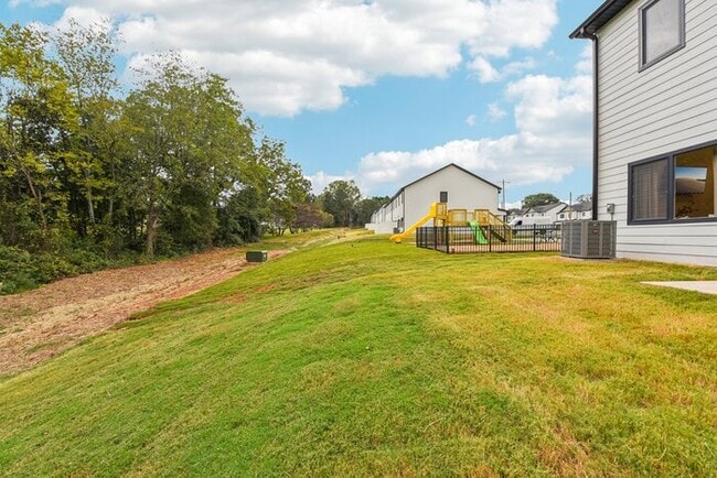 Building Photo - Brand-New Luxury Townhomes – 1st Month Fre...