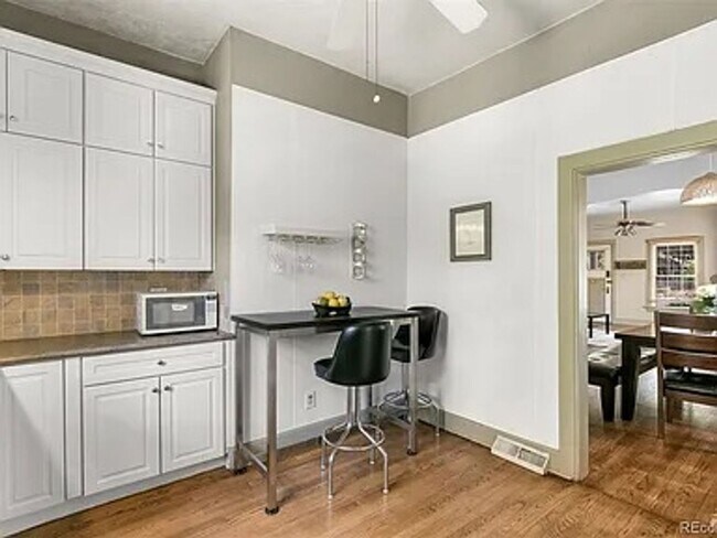 Building Photo - Charming 2 Bed 2 Bath house with Basement flex room in the heart of Englewood!