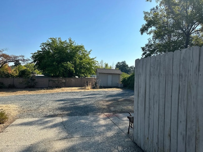 Building Photo - Welcome to this charming, newly remodeled rustic property offering privacy, comfort, and character.