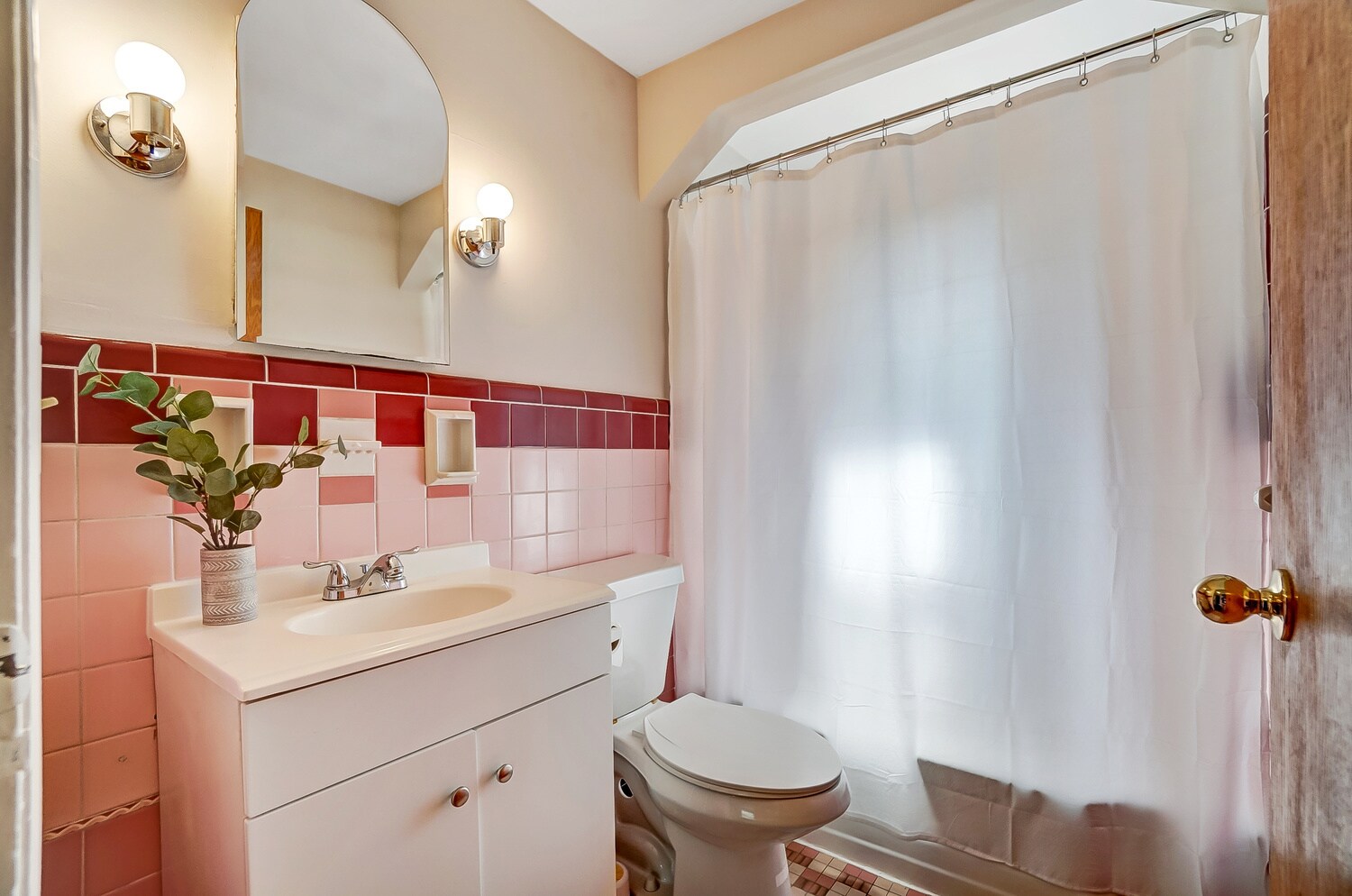 Original mid century tile in cheery bathroom. Newly reglazed tub + shower - 531 Norway Ave