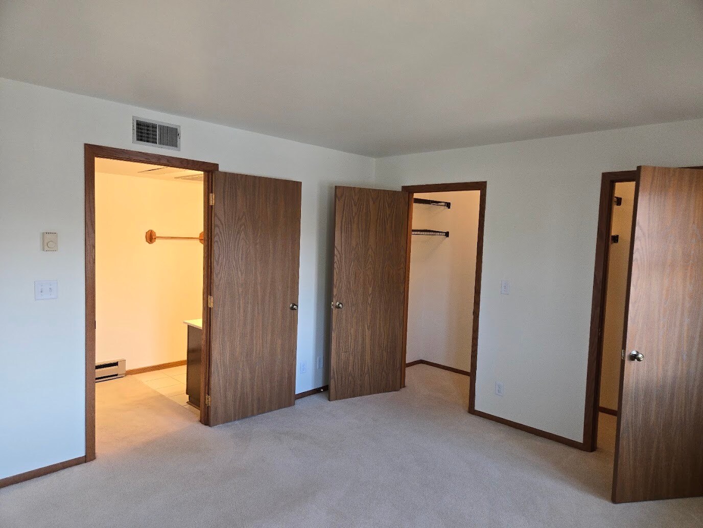 Bedroom view into bath area - W177N9731 Riversbend Cir E